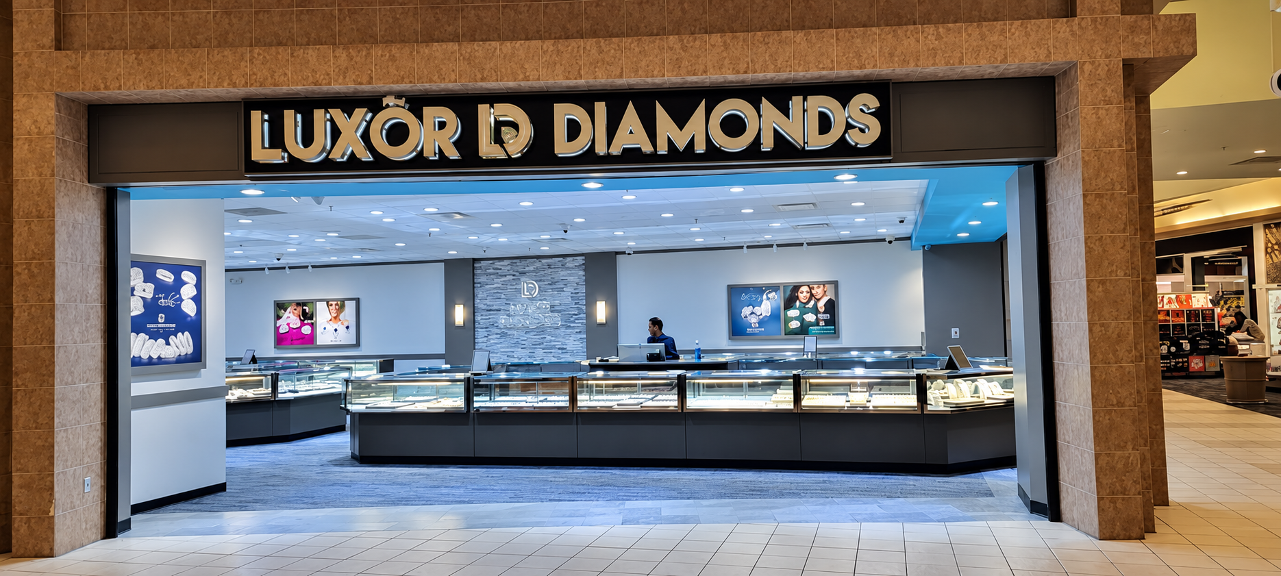 Luxor Diamonds storefront and illuminated jewellery showcases at Jefferson Mall, Louisville